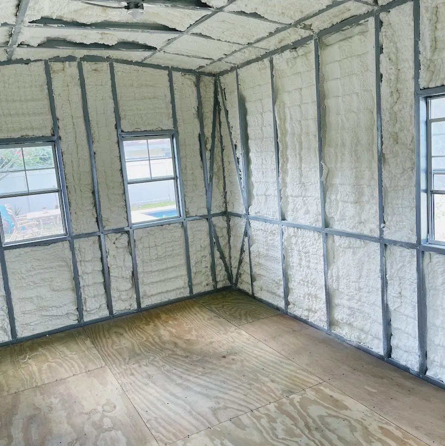 Closed-cell spray foam insulation applied to wall cavities in a residential project in Dunbar